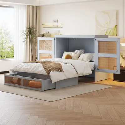 A bedroom with a murphy bed pulled out, showing storage drawers and rattan-fronted cabinets.