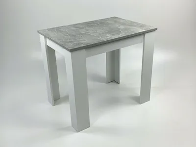 A product shot of a table with a concrete-look top and white legs, presented on a white background.