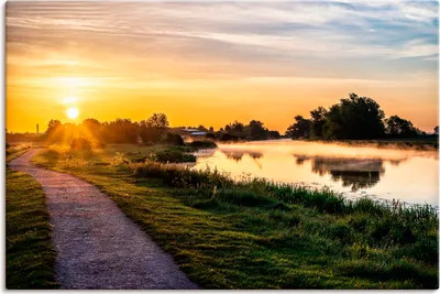 Produktbild von ARTland Leinwandbild Ruhiger Sonnenaufgang am Fluss Größe: 30x20 cm