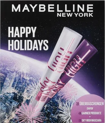 A marketing image for Maybelline featuring two mascara tubes against a backdrop of fireworks and a cityscape.