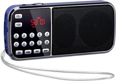 Immagine prodotto di Torcia LED portatile con radio e doppio altoparlante - Batteria ricaricabile da 1200 mAh - Radio FM - Compatibile con MP3, AUX, USB e TF