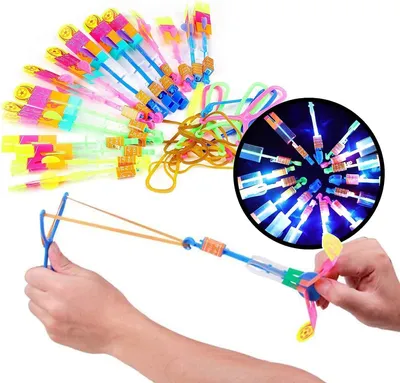 Produktbild von ANTCOOL Hubschrauber Fliegen Spielzeug, Licht Hubschrauber Fliegen LED Katapult, Fliegendes Party -Elastic Powered Sling Shot Heli Schleuder Pfeile Flare Copter- 20 Stück(Bunt)