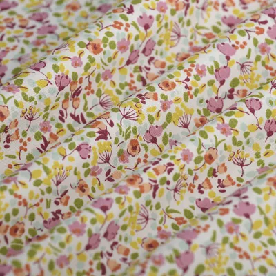 Produktbild von Bio Baumwollstoff 150 cm bunt floral MT