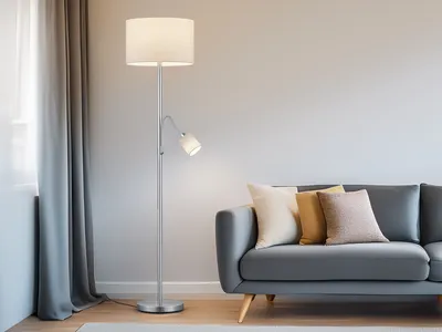 A modern living room with a gray sofa and a floor lamp.