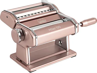 A rose gold Marcato Atlas 150 pasta maker is shown from a slightly elevated front-side angle against a white background.