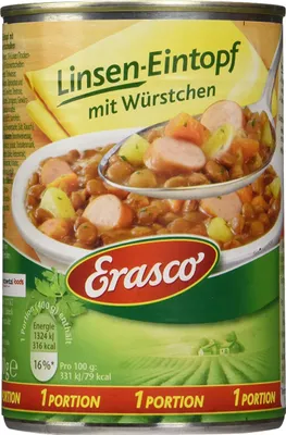 A close-up of a canned food product, specifically lentil stew with sausages.