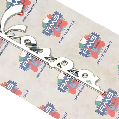 Produktbild von RMS Vespa Emblem Schriftzug Beinschild kompatibel mit Vespa ET2 50 2-Takt