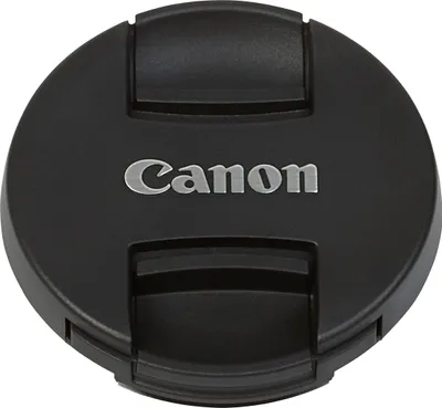 A black Canon lens cap with the Canon logo in silver.