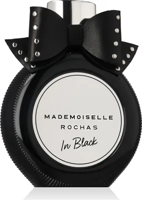 A studio shot of a black perfume bottle with a black bow on top.