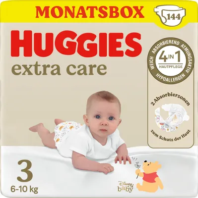 Packaging for Huggies Extra Care baby diapers, featuring a baby and Winnie the Pooh.
