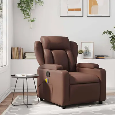A brown faux leather massage recliner chair is shown in a room setting with a small side table and some books on a shelf.