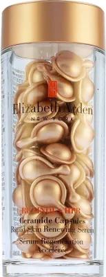 A clear studio shot of a bottle filled with Elizabeth Arden Ceramide Capsules.