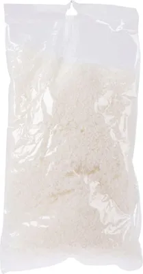 A clear plastic bag filled with white, granular material, likely artificial snow.