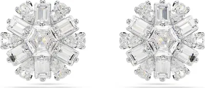 A pair of sparkling diamond earrings.