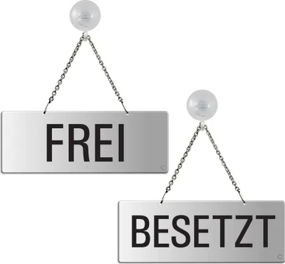 Two hanging signs, one labeled 'FREI' (Free) and the other 'BESETZT' (Occupied), suspended from clear suction cups.