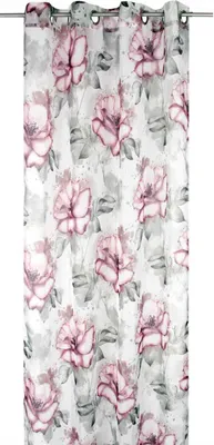 A close-up view of a curtain with a floral pattern.
