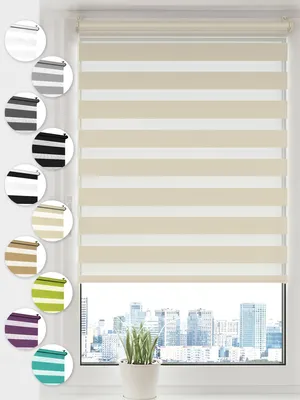 A close-up view of a cream and white striped roller blind covering a window with a city skyline visible in the background.