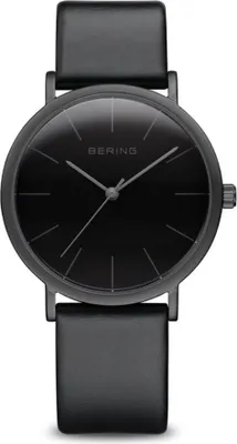 A close-up studio shot of a black Bering watch.