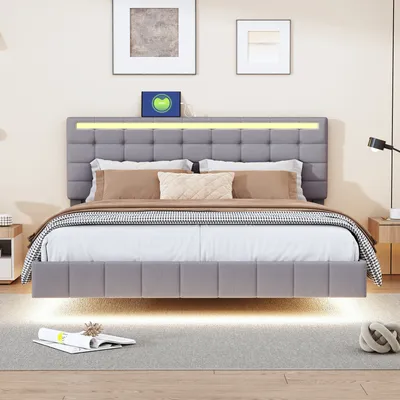 A modern upholstered bed with LED lighting in a bedroom setting.