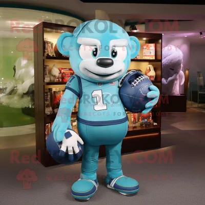 Produktbild von Cyanfarbener REDBROKOLY Maskottchen Kostüm charakter mit American-Football-Helm bekleidet mit einem Strampler und Messenger-Taschen