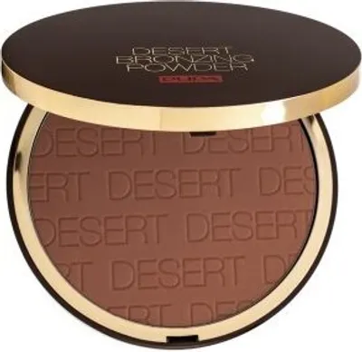 A bronzing powder compact with the lid open, showing the powder inside.