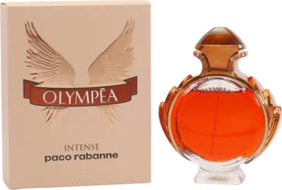 Runder Flakon von Olympea Intense mit kupferfarbener Flüssigkeit, verziert mit klaren Flügeln und bronzefarbenem Deckel.