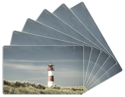 Produktbild von Wallario Frühstücksbrettchen 6er Set aus Glas, je 14 x 23 cm, mit rutschfesten Füßen, Motiv Leuchtturm auf der Düne am Strand