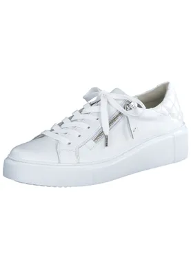 A white leather sneaker with a zipper detail and a quilted heel.