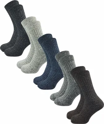 A collection of men's socks in various colors arranged diagonally on a white background.