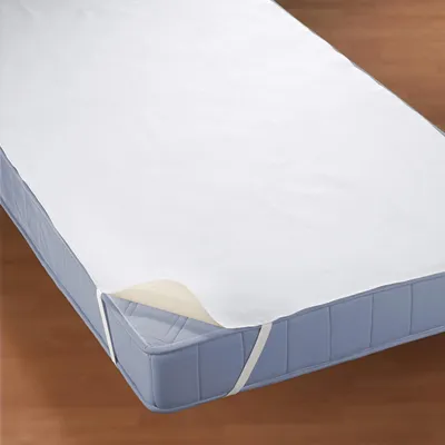 A mattress protector is shown on a mattress.