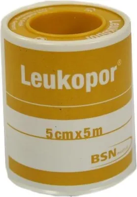 A roll of medical tape on a white background.
