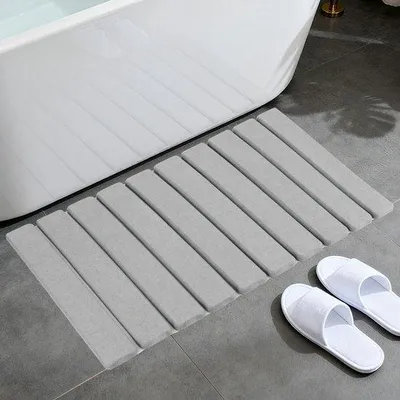 Immagine prodotto di Tappetino antiscivolo per il bagno ad asciugatura rapida, realizzato in diatomee – ideale per bagno e cucina, assorbente, resistente ai graffi e salvaspazio