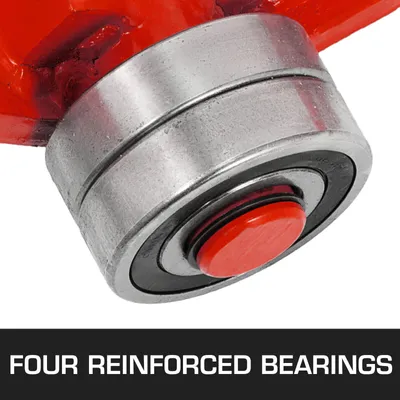 A close-up view of a reinforced bearing with a red cap, part of a heavy-duty pry bar.