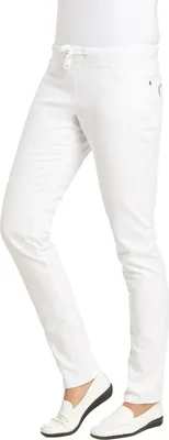 A person wearing white pants and white shoes, shown from the waist down.