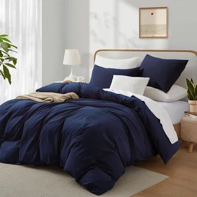 Produktbild von Unyqoos® Baumwoll-Bettbezug-Set für Einzelbett 135×200 cm mit Kissenbezug 80×80 cm, weich & blau/dunkelblau, mit Reißverschluss, pflegeleicht
