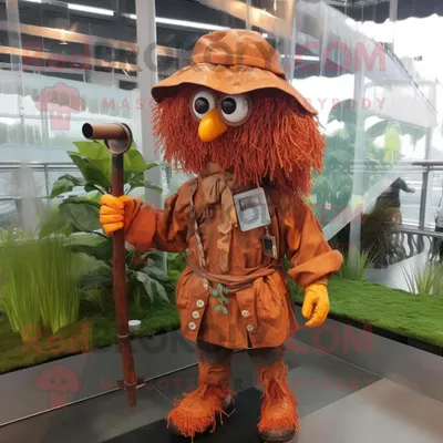 Produktbild von Rostfarbene REDBROKOLY Vogelscheuche Maskottchen Kostüm figur bekleidet mit einem Regenmantel und Halsketten