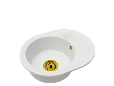 A white oval sink with a gold drain.