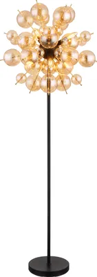 A floor lamp with a black stand and a spherical, starburst-like light fixture made of gold-colored glass orbs.