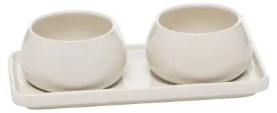 Two white ceramic bowls on a white rectangular tray.