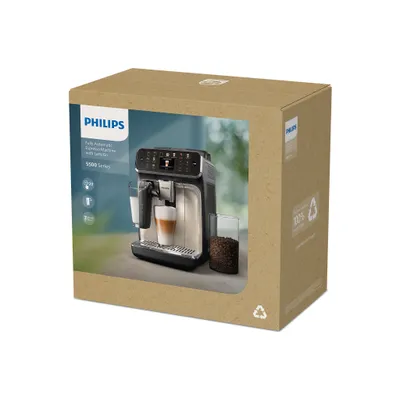 A cardboard box containing a Philips coffee maker.