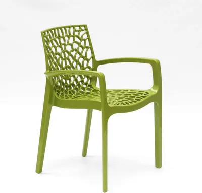 A single green plastic chair with an open, web-like design on a white background.