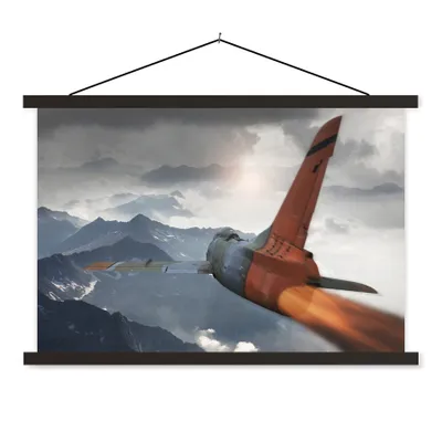 Produktbild von MuchoWow® Textilposter Ein Armeejet über den Bergen 60x40 cm mit schwarzem Rahmen - Hölzernes
