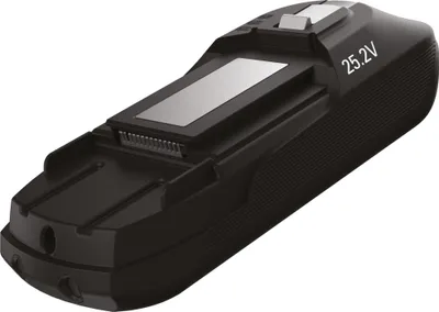 A black battery pack with silver accents and markings.