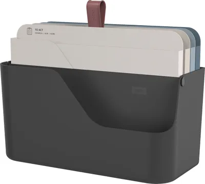 A dark gray desk organizer with several file folders inside.