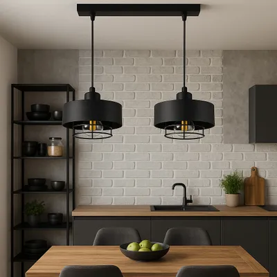 A modern kitchen with a dining table and pendant lights.