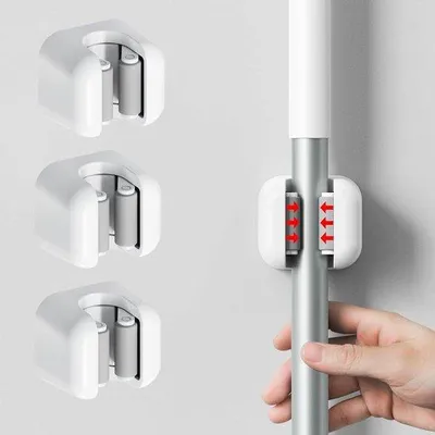 Produktbild von Mop und Bürstenhalter für Wandmontage - Selbstklebend - Für Bürste und Mop - Raumsparend