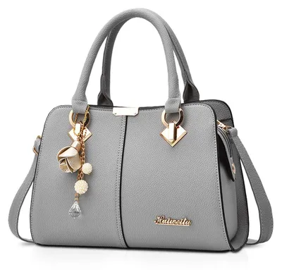 Imagen del producto de Elzusha - Bolso de mano para mujer, hecho de cuero sintético (PU), con flecos