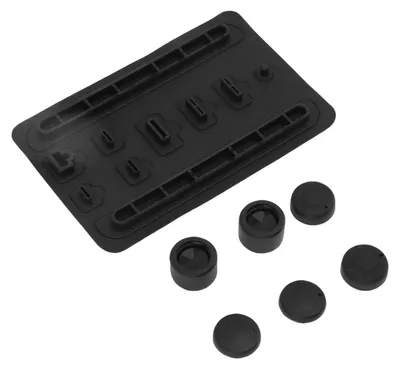Produktbild von Staubschutz-Set für Spielkonsolen, passend für Switch 2. Enthält weiche, staubdichte Silikon-Anschlussschutzstopfen und Griffkappen für die Sticks