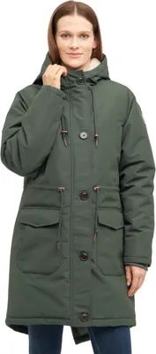 A woman is modeling a green winter coat.