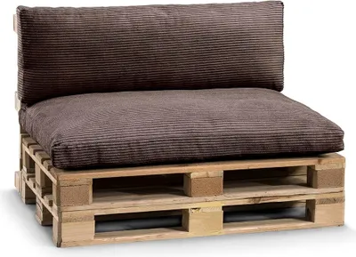 A close-up shot of a modular sofa cushion set made from a wooden pallet and upholstered in dark brown corduroy fabric.